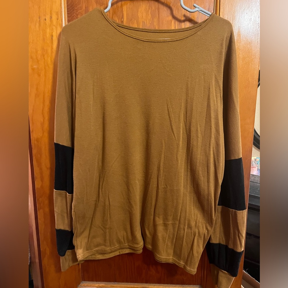 Tan sweater with black stripe sleeve